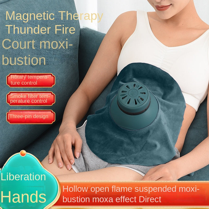 Magnetisches Moxibustion Wärmegerät flammenlos tragbar in Grün auf Tisch